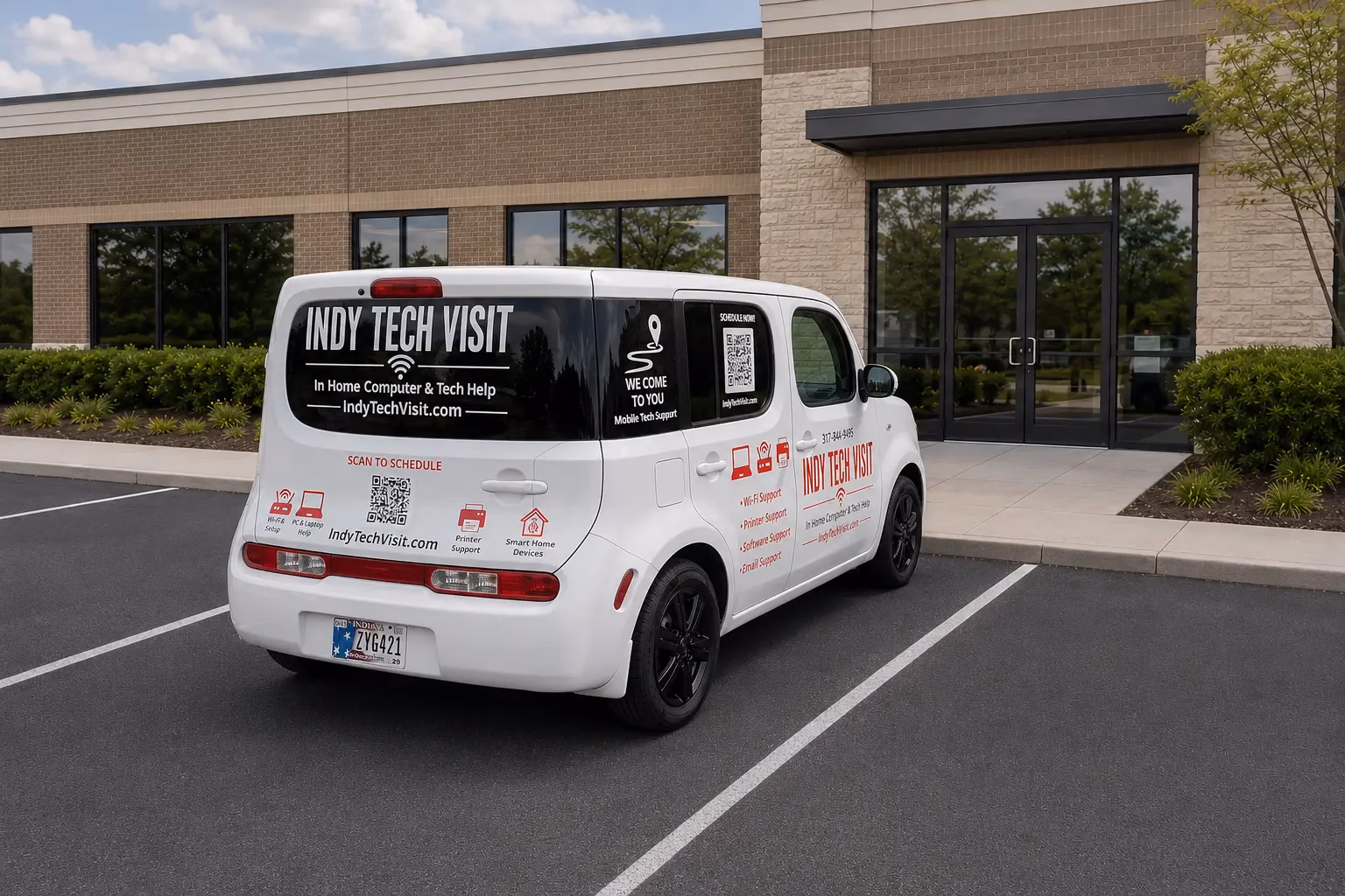 Indy Tech Visit service vehicle parked outside a professional office for on-site business computer support in Indianapolis